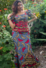 Colorful African print blouse and yellow skirt