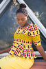 Colorful African print blouse and yellow skirt