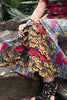 Colorful African print blouse and yellow skirt