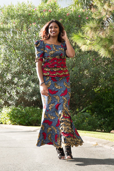 Colorful African print blouse and yellow skirt