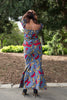 Colorful African print blouse and yellow skirt